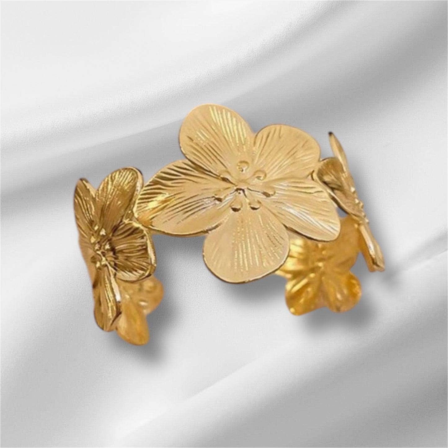 Bracelet/Jonc Fleuria fleurs, acier inoxydable doré.