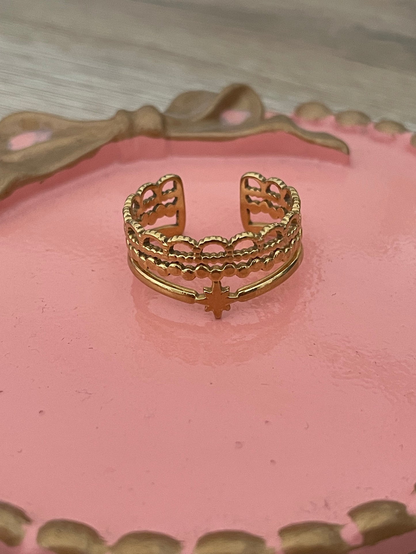 Bague étoile, Cyrius acier inoxydable doré.