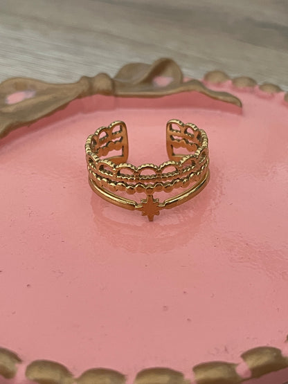 Bague étoile, Cyrius acier inoxydable doré.