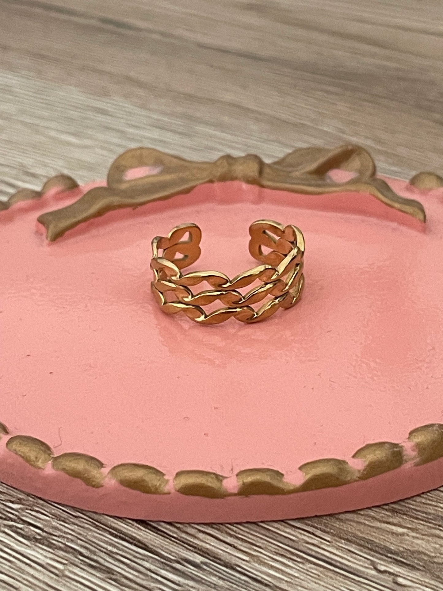 Bague Orléane, vagues, acier inoxydable doré.